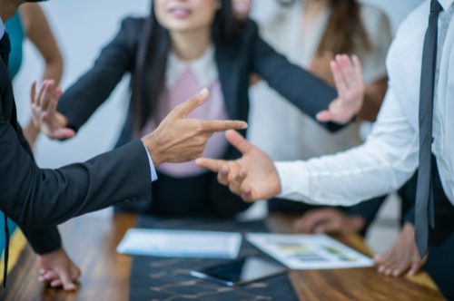 A high-tension conflict situation illustrating the critical need for verbal de-escalation skills and disciplined intervention by Diligence Security Officers