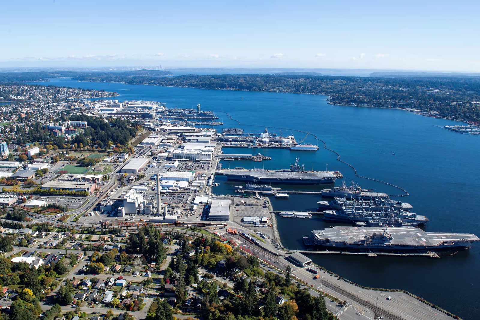 Industrial maritime facility and shipyard perimeter in Bremerton, highlighting specialized On-site Security Officers and Mobile Patrol for defense-adjacent logistics.
