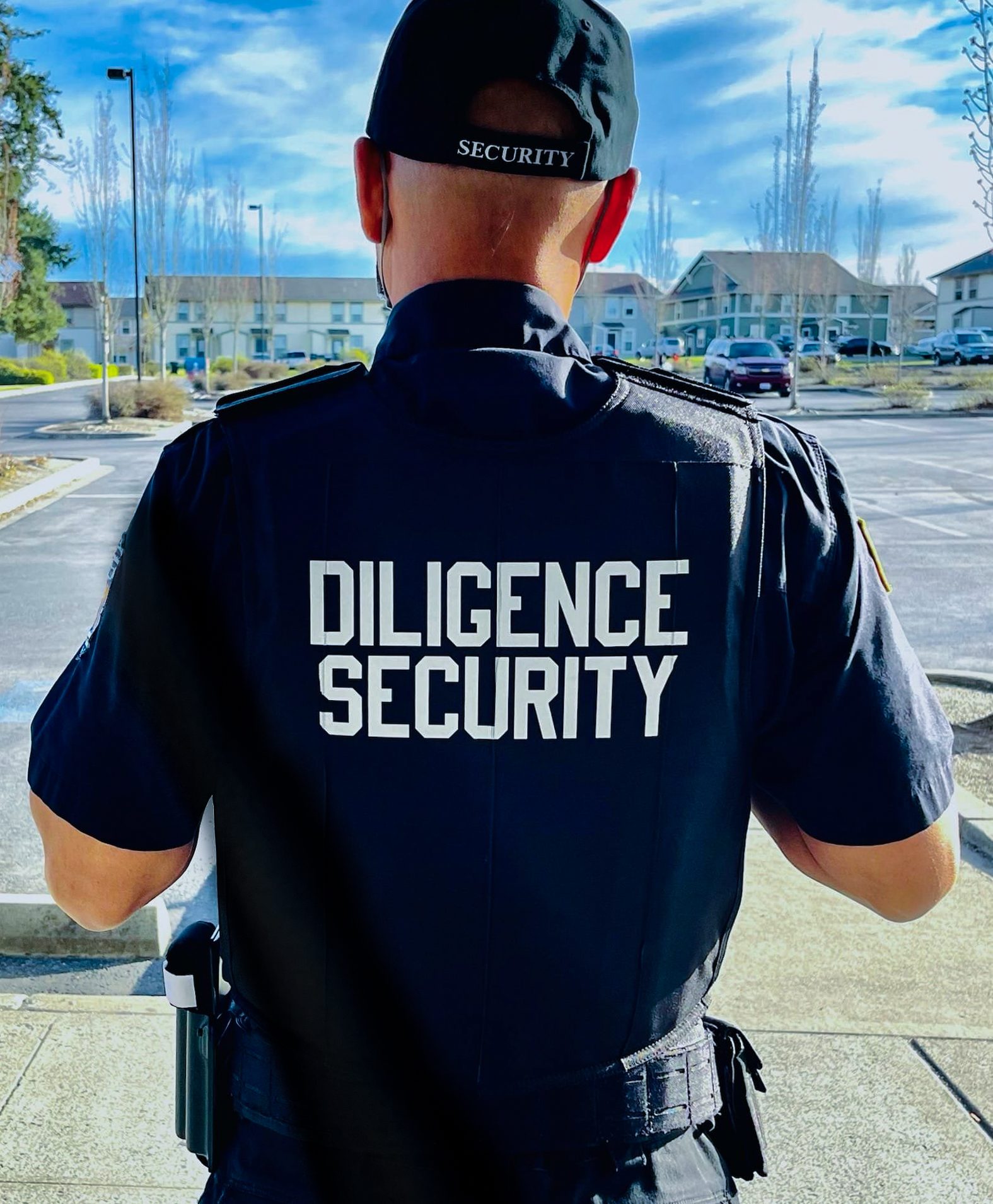 Uniformed Diligence Security on-site Officer conducting an interior patrol